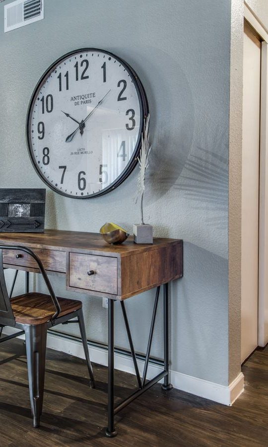 a clock is on the wall in this home at The  Mark at 2600